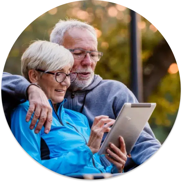 happy older couple reading their rental financial reports
