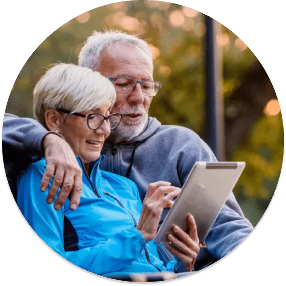 happy older couple reading their rental financial reports